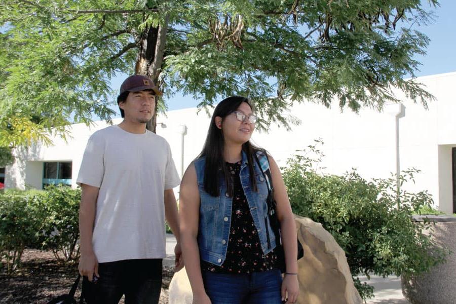 Two students standing outside on SJC Campus